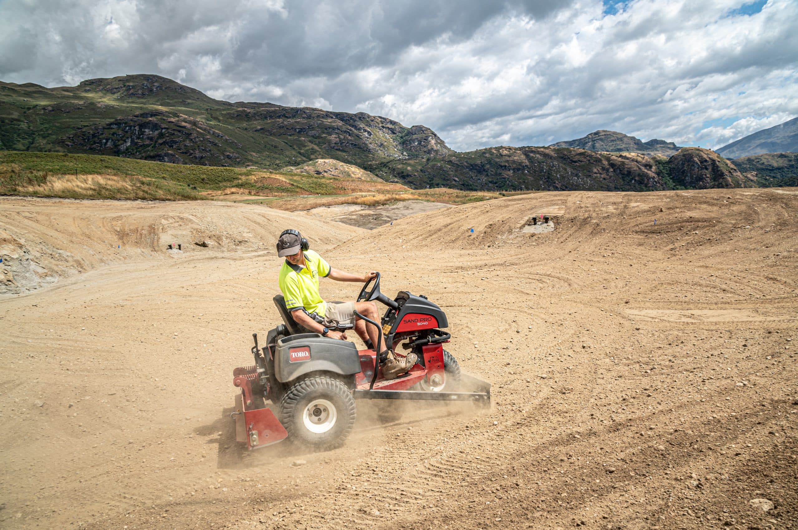 Specialised golf course equipment – Toro Sand Pro working in sand bunker